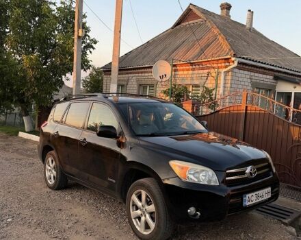 Черный Тойота РАВ 4, объемом двигателя 2.36 л и пробегом 210 тыс. км за 9500 $, фото 1 на Automoto.ua