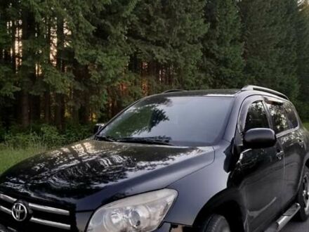 Черный Тойота РАВ 4, объемом двигателя 2.36 л и пробегом 207 тыс. км за 9200 $, фото 1 на Automoto.ua