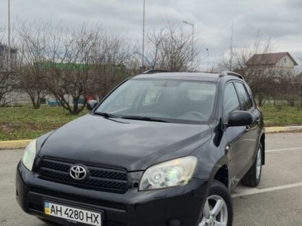 Чорний Тойота РАВ 4, об'ємом двигуна 2 л та пробігом 173 тис. км за 8999 $, фото 1 на Automoto.ua