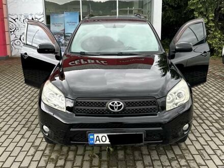 Чорний Тойота РАВ 4, об'ємом двигуна 2 л та пробігом 245 тис. км за 7999 $, фото 1 на Automoto.ua