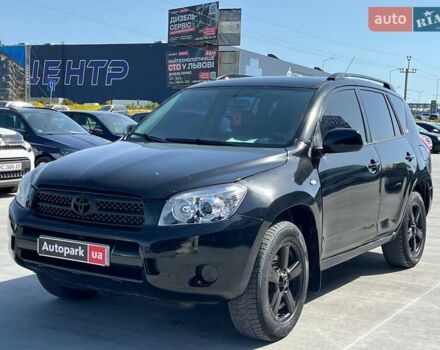 Чорний Тойота РАВ 4, об'ємом двигуна 2 л та пробігом 300 тис. км за 8290 $, фото 1 на Automoto.ua