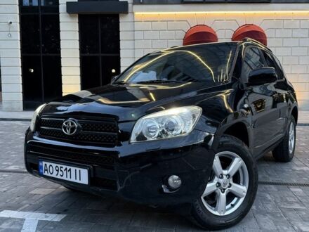 Чорний Тойота РАВ 4, об'ємом двигуна 2 л та пробігом 248 тис. км за 8801 $, фото 1 на Automoto.ua