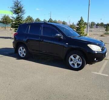 Черный Тойота РАВ 4, объемом двигателя 2 л и пробегом 165 тыс. км за 9500 $, фото 1 на Automoto.ua