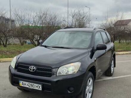Чорний Тойота РАВ 4, об'ємом двигуна 2 л та пробігом 173 тис. км за 8600 $, фото 1 на Automoto.ua