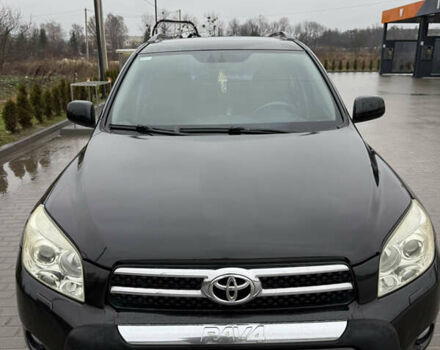 Чорний Тойота РАВ 4, об'ємом двигуна 2 л та пробігом 242 тис. км за 10200 $, фото 1 на Automoto.ua