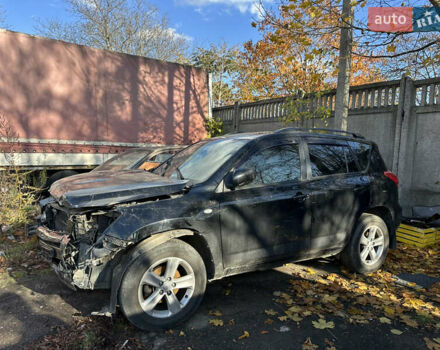 Черный Тойота РАВ 4, объемом двигателя 2 л и пробегом 200 тыс. км за 6500 $, фото 1 на Automoto.ua