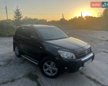 Чорний Тойота РАВ 4, об'ємом двигуна 2 л та пробігом 273 тис. км за 10500 $, фото 1 на Automoto.ua