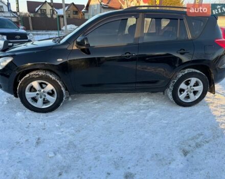 Черный Тойота РАВ 4, объемом двигателя 2 л и пробегом 226 тыс. км за 7950 $, фото 1 на Automoto.ua