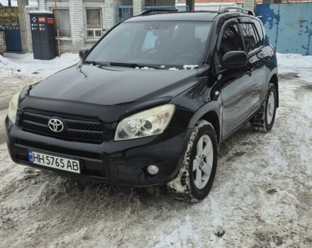 Черный Тойота РАВ 4, объемом двигателя 2 л и пробегом 310 тыс. км за 7500 $, фото 1 на Automoto.ua