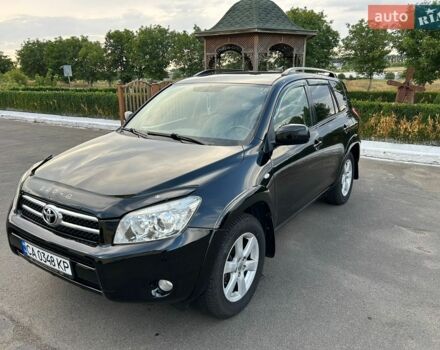 Черный Тойота РАВ 4, объемом двигателя 2.36 л и пробегом 260 тыс. км за 8800 $, фото 1 на Automoto.ua