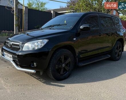 Черный Тойота РАВ 4, объемом двигателя 2.36 л и пробегом 212 тыс. км за 8900 $, фото 1 на Automoto.ua