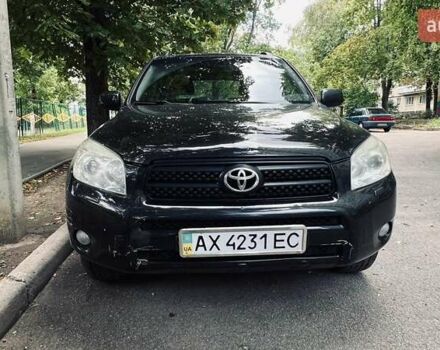 Чорний Тойота РАВ 4, об'ємом двигуна 2 л та пробігом 220 тис. км за 9300 $, фото 1 на Automoto.ua