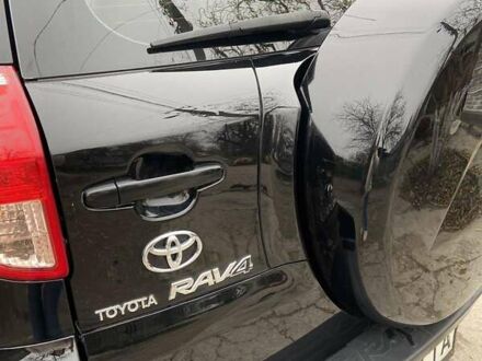 Черный Тойота РАВ 4, объемом двигателя 2 л и пробегом 218 тыс. км за 9700 $, фото 1 на Automoto.ua