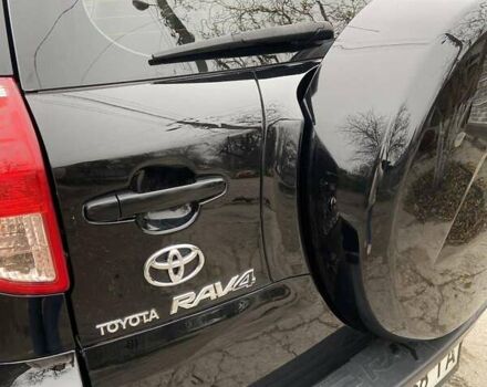 Чорний Тойота РАВ 4, об'ємом двигуна 2 л та пробігом 218 тис. км за 9700 $, фото 1 на Automoto.ua