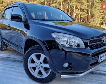 Черный Тойота РАВ 4, объемом двигателя 2.4 л и пробегом 187 тыс. км за 9850 $, фото 1 на Automoto.ua