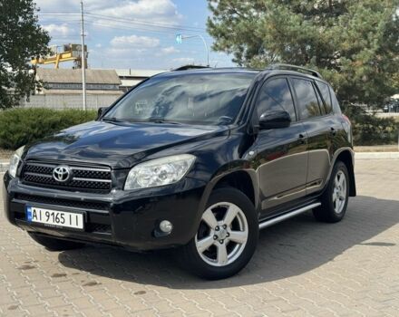 Черный Тойота РАВ 4, объемом двигателя 2 л и пробегом 250 тыс. км за 8900 $, фото 1 на Automoto.ua