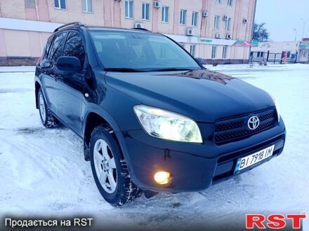 Черный Тойота РАВ 4, объемом двигателя 2 л и пробегом 21800 тыс. км за 8650 $, фото 1 на Automoto.ua