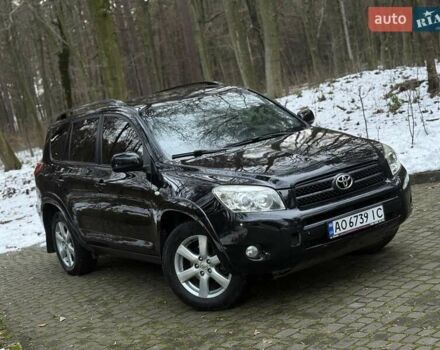 Черный Тойота РАВ 4, объемом двигателя 2.36 л и пробегом 267 тыс. км за 7777 $, фото 1 на Automoto.ua