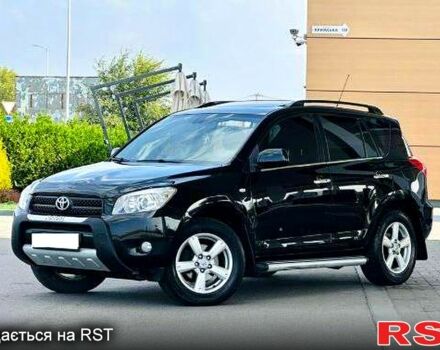 Черный Тойота РАВ 4, объемом двигателя 2 л и пробегом 200 тыс. км за 11000 $, фото 1 на Automoto.ua