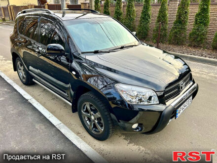 Черный Тойота РАВ 4, объемом двигателя 2 л и пробегом 186 тыс. км за 11500 $, фото 1 на Automoto.ua