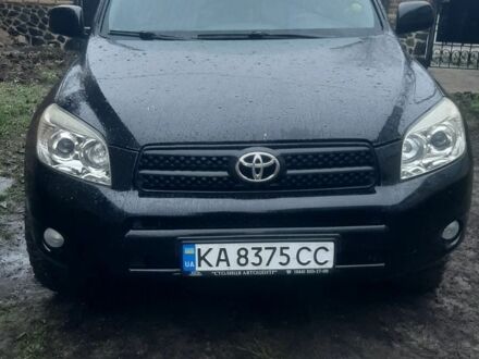 Черный Тойота РАВ 4, объемом двигателя 2.4 л и пробегом 317 тыс. км за 9500 $, фото 1 на Automoto.ua