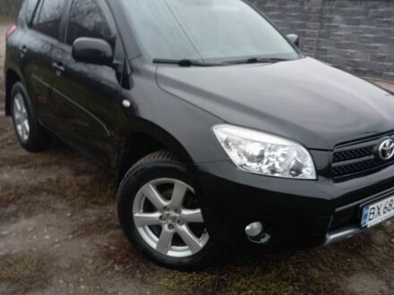 Черный Тойота РАВ 4, объемом двигателя 2 л и пробегом 225 тыс. км за 9000 $, фото 1 на Automoto.ua