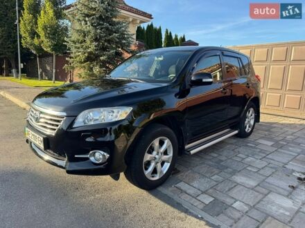 Чорний Тойота РАВ 4, об'ємом двигуна 2 л та пробігом 209 тис. км за 11999 $, фото 1 на Automoto.ua