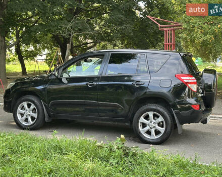 Чорний Тойота РАВ 4, об'ємом двигуна 2 л та пробігом 140 тис. км за 11500 $, фото 1 на Automoto.ua