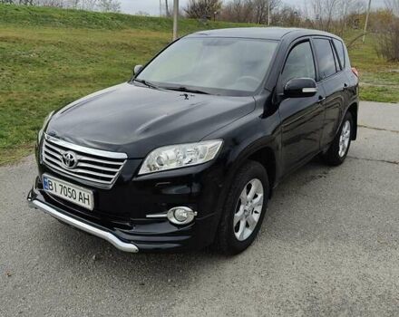 Черный Тойота РАВ 4, объемом двигателя 2 л и пробегом 120 тыс. км за 16000 $, фото 1 на Automoto.ua