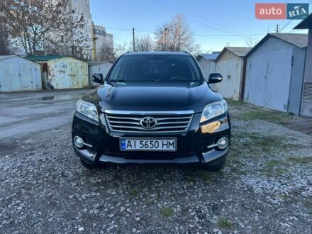 Чорний Тойота РАВ 4, об'ємом двигуна 2 л та пробігом 126 тис. км за 12200 $, фото 1 на Automoto.ua