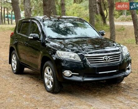 Чорний Тойота РАВ 4, об'ємом двигуна 2 л та пробігом 153 тис. км за 12999 $, фото 1 на Automoto.ua