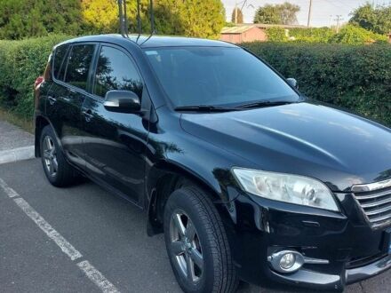 Чорний Тойота РАВ 4, об'ємом двигуна 2 л та пробігом 213 тис. км за 14500 $, фото 1 на Automoto.ua