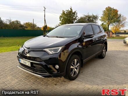 Чорний Тойота РАВ 4, об'ємом двигуна 2 л та пробігом 210 тис. км за 14300 $, фото 1 на Automoto.ua