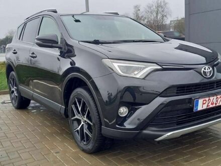 Черный Тойота РАВ 4, объемом двигателя 2 л и пробегом 128 тыс. км за 9100 $, фото 1 на Automoto.ua