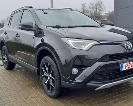 Черный Тойота РАВ 4, объемом двигателя 2 л и пробегом 128 тыс. км за 9100 $, фото 1 на Automoto.ua