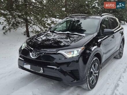 Черный Тойота РАВ 4, объемом двигателя 2.49 л и пробегом 95 тыс. км за 18500 $, фото 1 на Automoto.ua