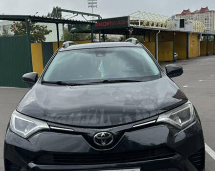 Чорний Тойота РАВ 4, об'ємом двигуна 2.49 л та пробігом 128 тис. км за 23200 $, фото 1 на Automoto.ua