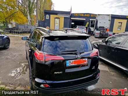 Черный Тойота РАВ 4, объемом двигателя 2.5 л и пробегом 128 тыс. км за 23000 $, фото 1 на Automoto.ua