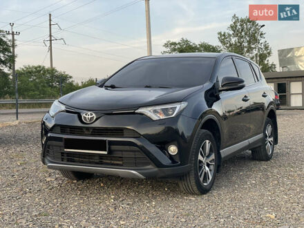 Чорний Тойота РАВ 4, об'ємом двигуна 2 л та пробігом 180 тис. км за 22700 $, фото 1 на Automoto.ua