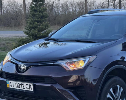 Фіолетовий Тойота РАВ 4, об'ємом двигуна 2.49 л та пробігом 142 тис. км за 16900 $, фото 1 на Automoto.ua