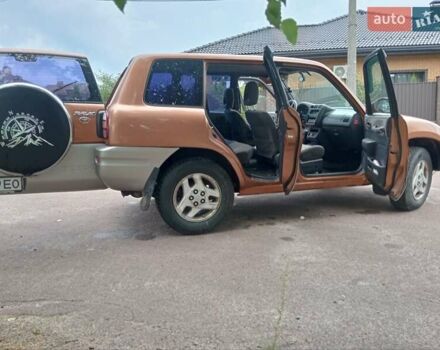 Коричневый Тойота РАВ 4, объемом двигателя 2 л и пробегом 218 тыс. км за 5000 $, фото 1 на Automoto.ua