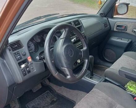 Коричневый Тойота РАВ 4, объемом двигателя 2 л и пробегом 218 тыс. км за 5000 $, фото 5 на Automoto.ua