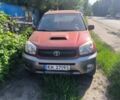 Красный Тойота РАВ 4, объемом двигателя 2 л и пробегом 312 тыс. км за 3000 $, фото 1 на Automoto.ua