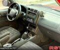 Червоний Тойота РАВ 4, об'ємом двигуна 2 л та пробігом 186 тис. км за 5950 $, фото 6 на Automoto.ua