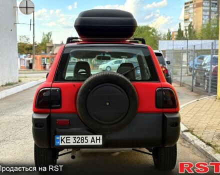 Червоний Тойота РАВ 4, об'ємом двигуна 2 л та пробігом 186 тис. км за 5950 $, фото 4 на Automoto.ua