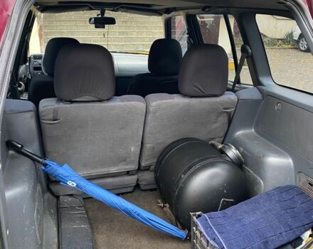 Красный Тойота РАВ 4, объемом двигателя 2 л и пробегом 440 тыс. км за 6300 $, фото 4 на Automoto.ua