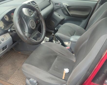 Красный Тойота РАВ 4, объемом двигателя 2 л и пробегом 370 тыс. км за 3500 $, фото 4 на Automoto.ua