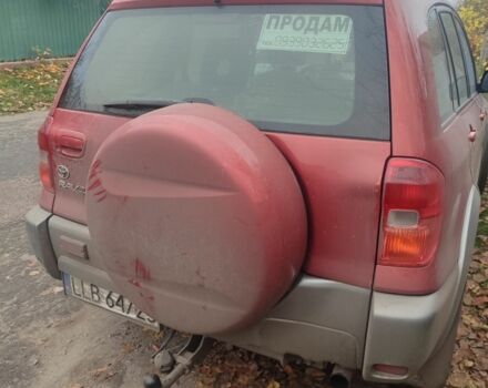 Красный Тойота РАВ 4, объемом двигателя 2 л и пробегом 370 тыс. км за 3500 $, фото 1 на Automoto.ua