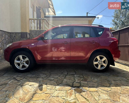 Красный Тойота РАВ 4, объемом двигателя 2 л и пробегом 98 тыс. км за 10700 $, фото 1 на Automoto.ua