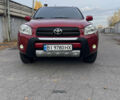 Червоний Тойота РАВ 4, об'ємом двигуна 2 л та пробігом 195 тис. км за 8999 $, фото 7 на Automoto.ua